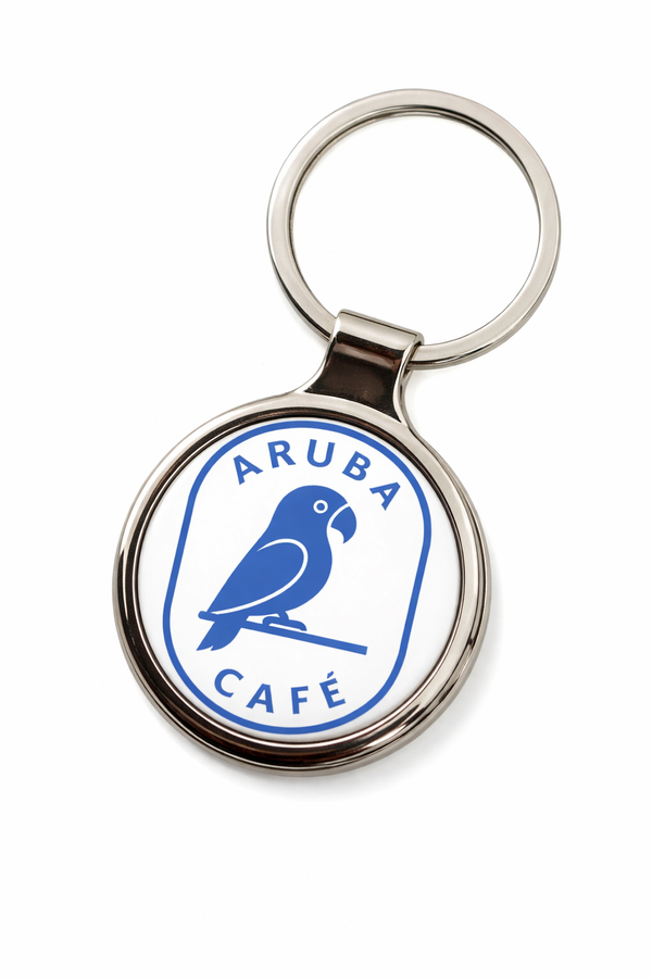 Custom Epoxy Keychain with Aruba Cafe logo featuring a parrot on a white background