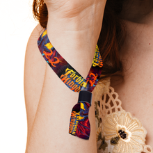 Colorful wristband 
with text worn around a person's neck