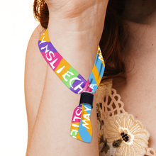 Colorful Custom Fabric Wristbands with text worn around a person's neck