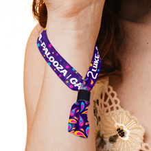 Purple Custom Fabric Wristbands with colorful design worn around a neck