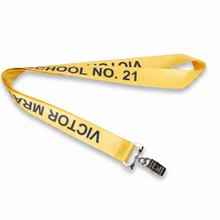 A yellow fabric Custom Nylon Lanyards with black printed text reading 'VICTOR MRA SCHOOL NO. 21' and a silver metal clip, shown on a plain white background.