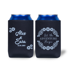 Two black can coolers with personalized text and floral designs on a white background